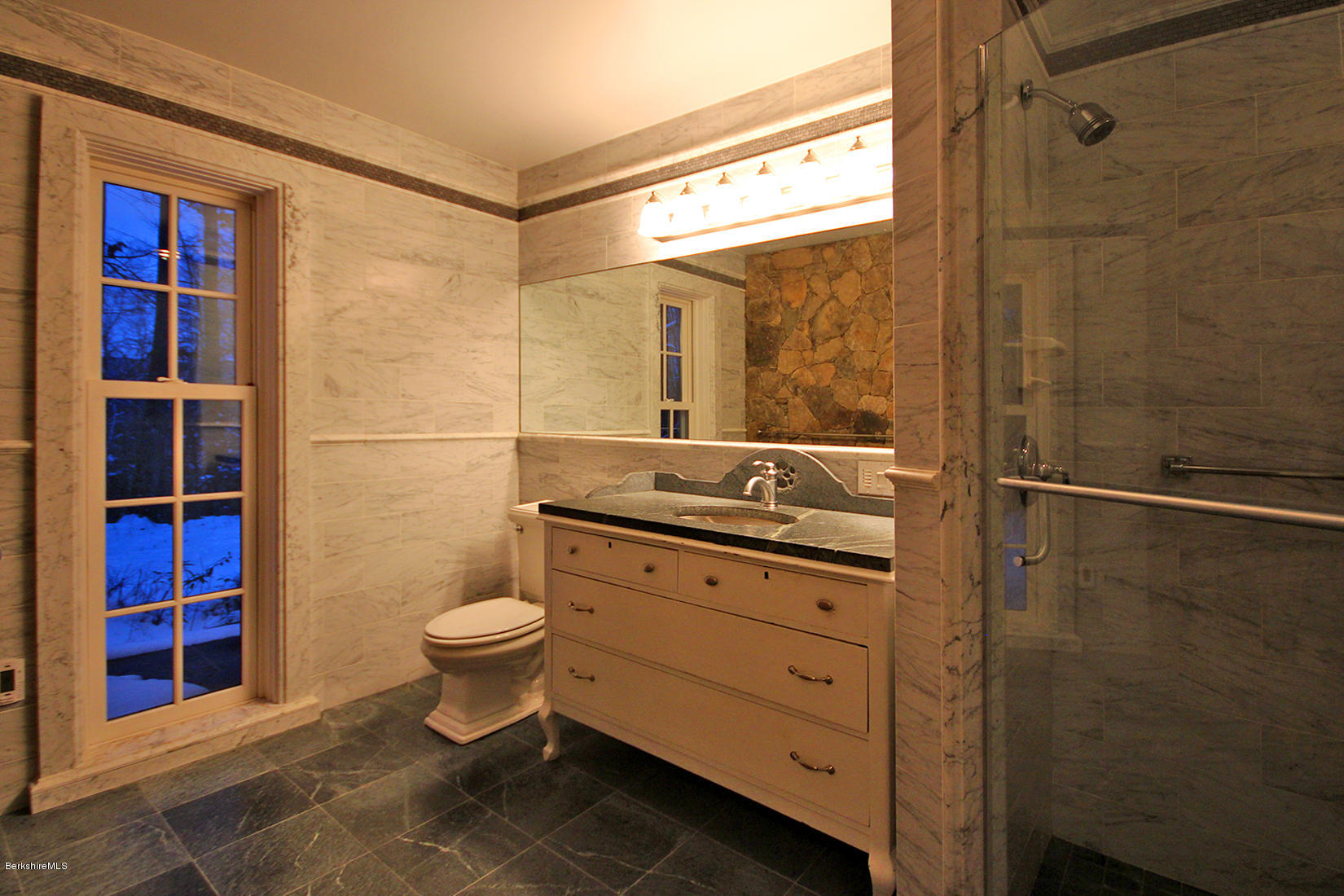 315 Canaan Road Sheffield, MA 01222 - Photo 19 of 40 a bathroom with a granite countertop sink a toilet a mirror and shower