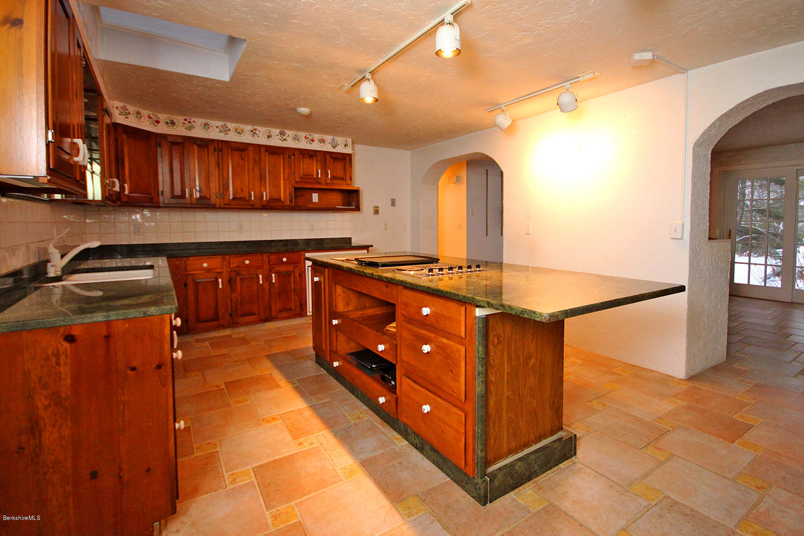 315 Canaan Road Sheffield, MA 01222 - Photo 21 of 40 a kitchen with stainless steel appliances granite countertop a sink and cabinets