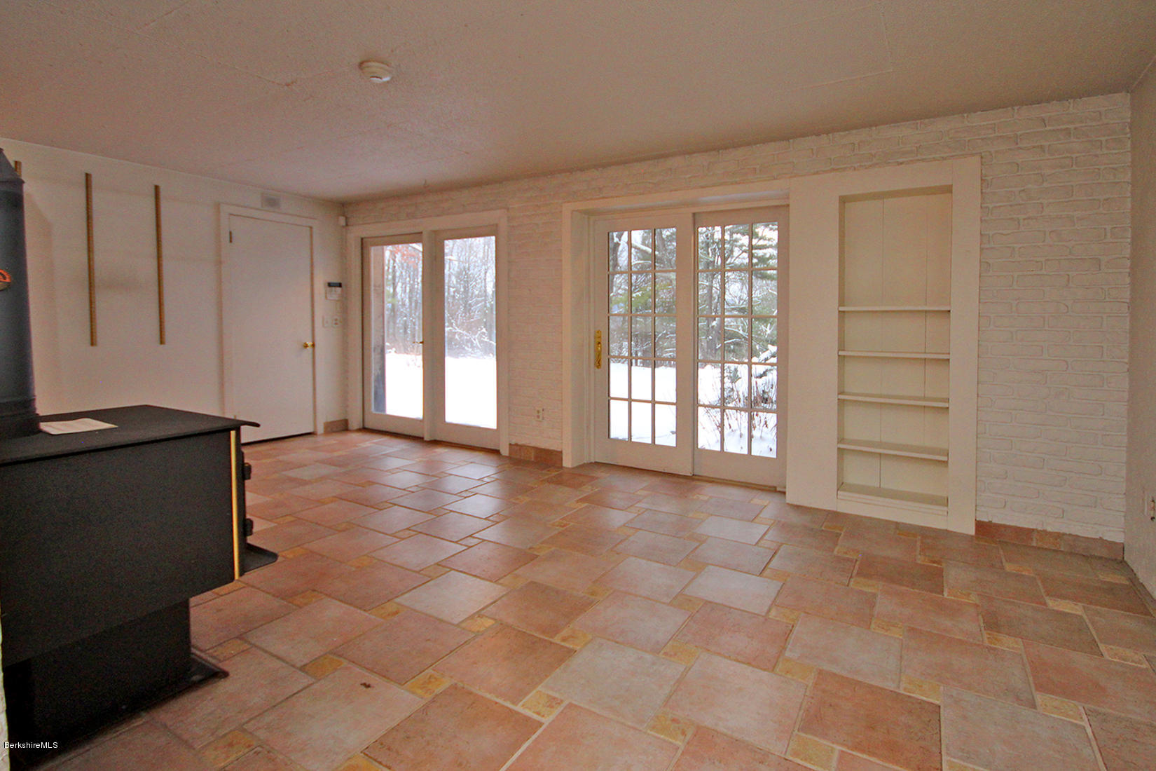 315 Canaan Road Sheffield, MA 01222 - Photo 23 of 40 a view of an empty room with a window