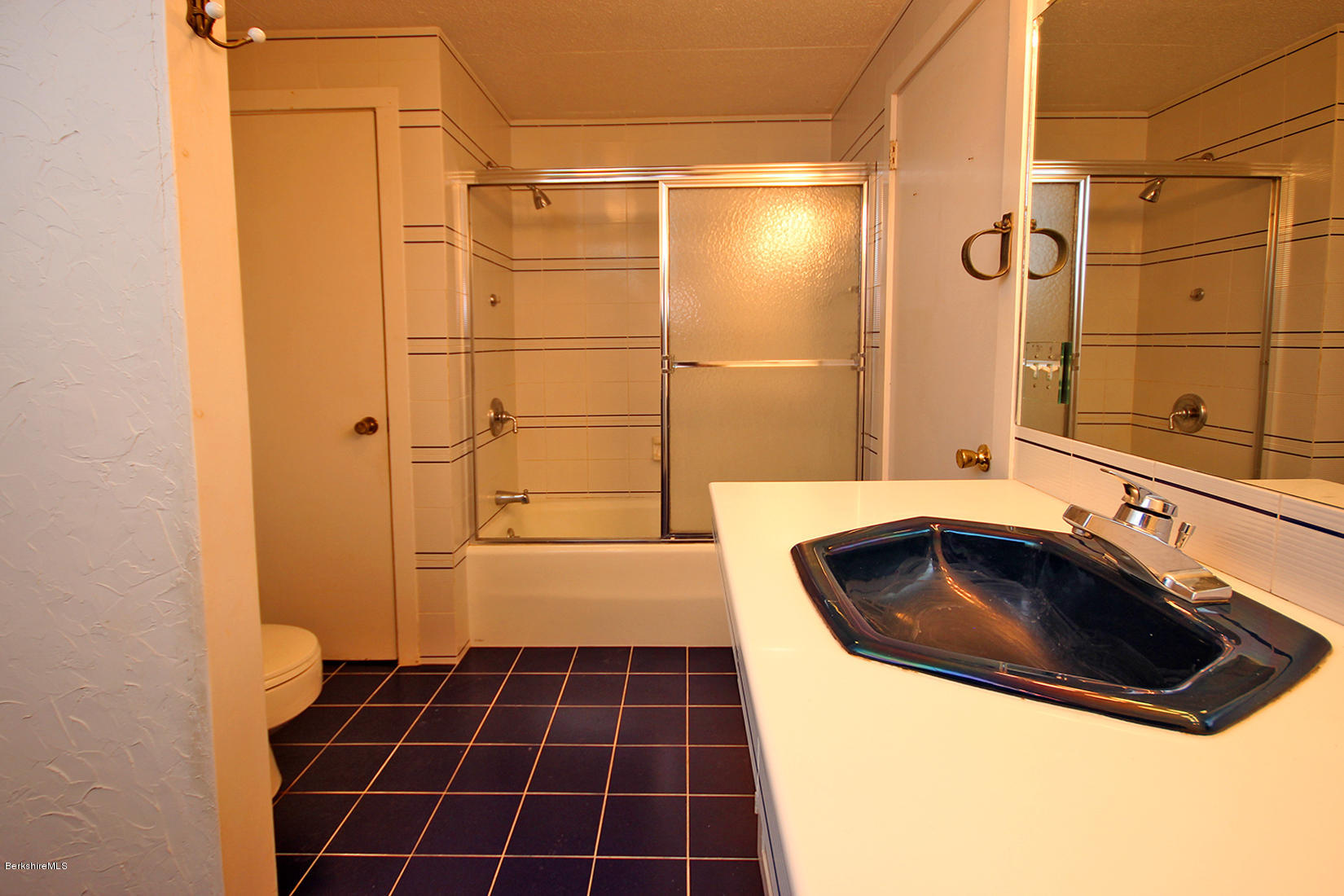315 Canaan Road Sheffield, MA 01222 - Photo 26 of 40 a bathroom with a sink a toilet and shower