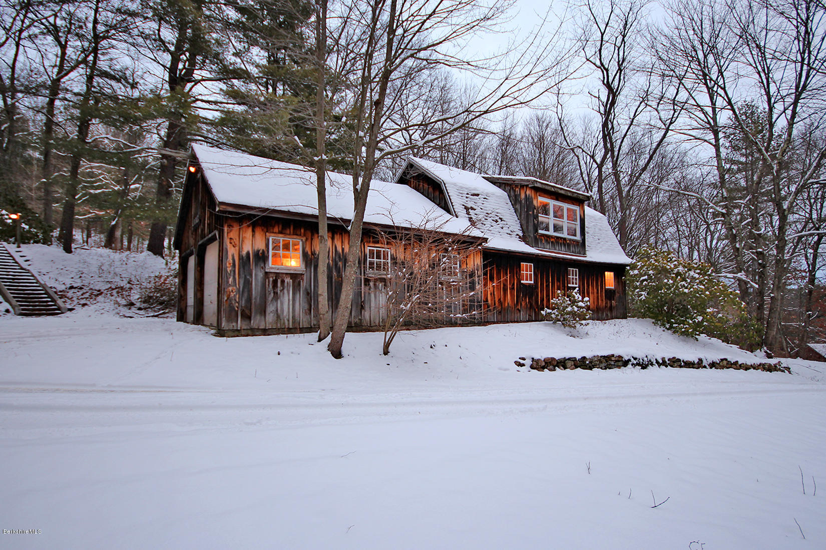 315 Canaan Road Sheffield, MA 01222 - Photo 29 of 40 a front view of a house with a yard covered with snow