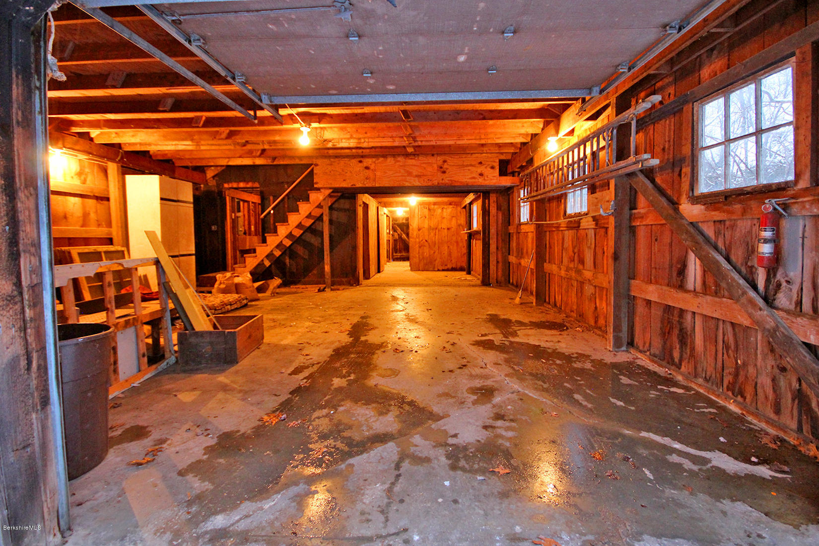 315 Canaan Road Sheffield, MA 01222 - Photo 31 of 40 a view of an empty room with wooden floor