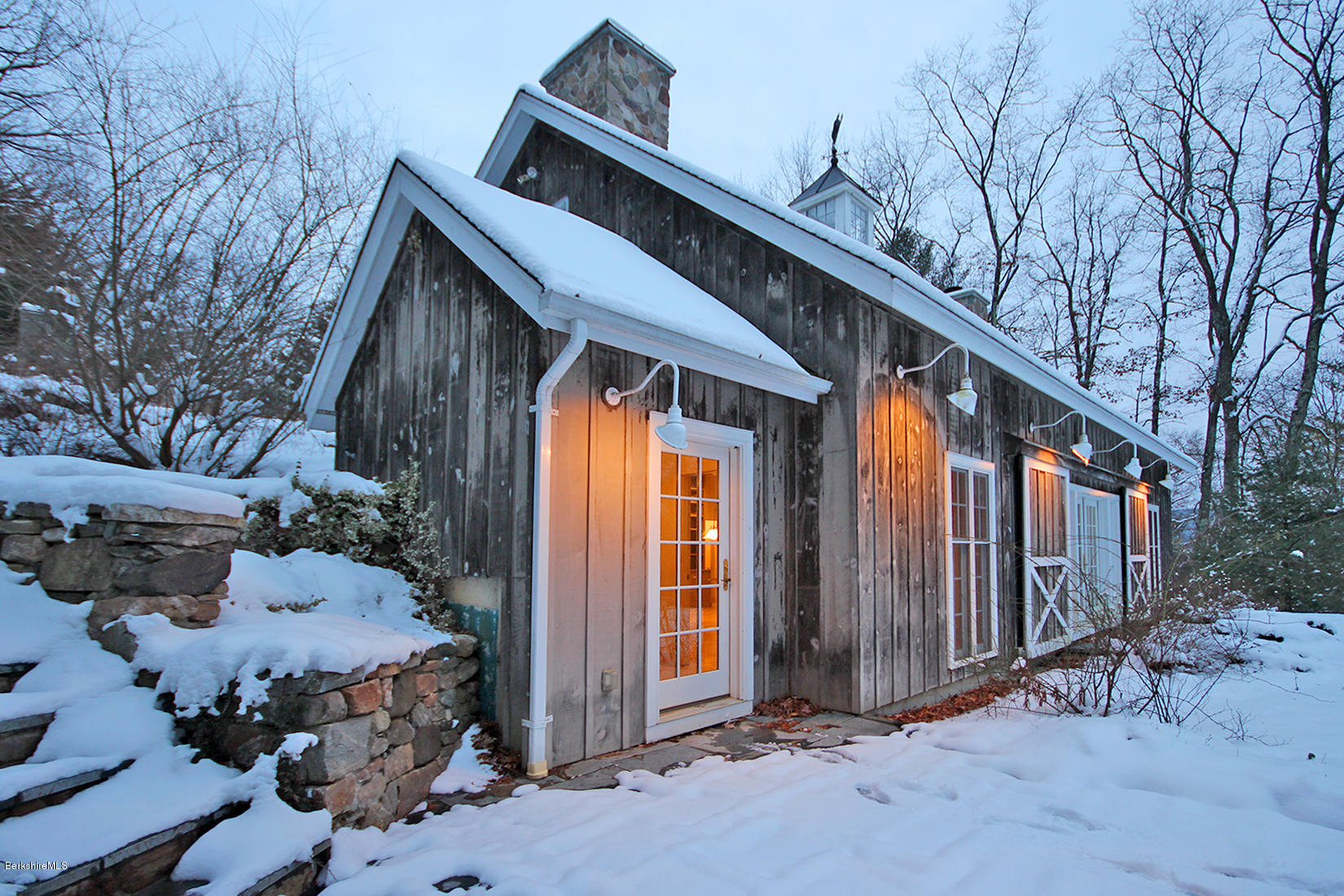 315 Canaan Road Sheffield, MA 01222 - Photo 5 of 40 a front view of a house with parking area