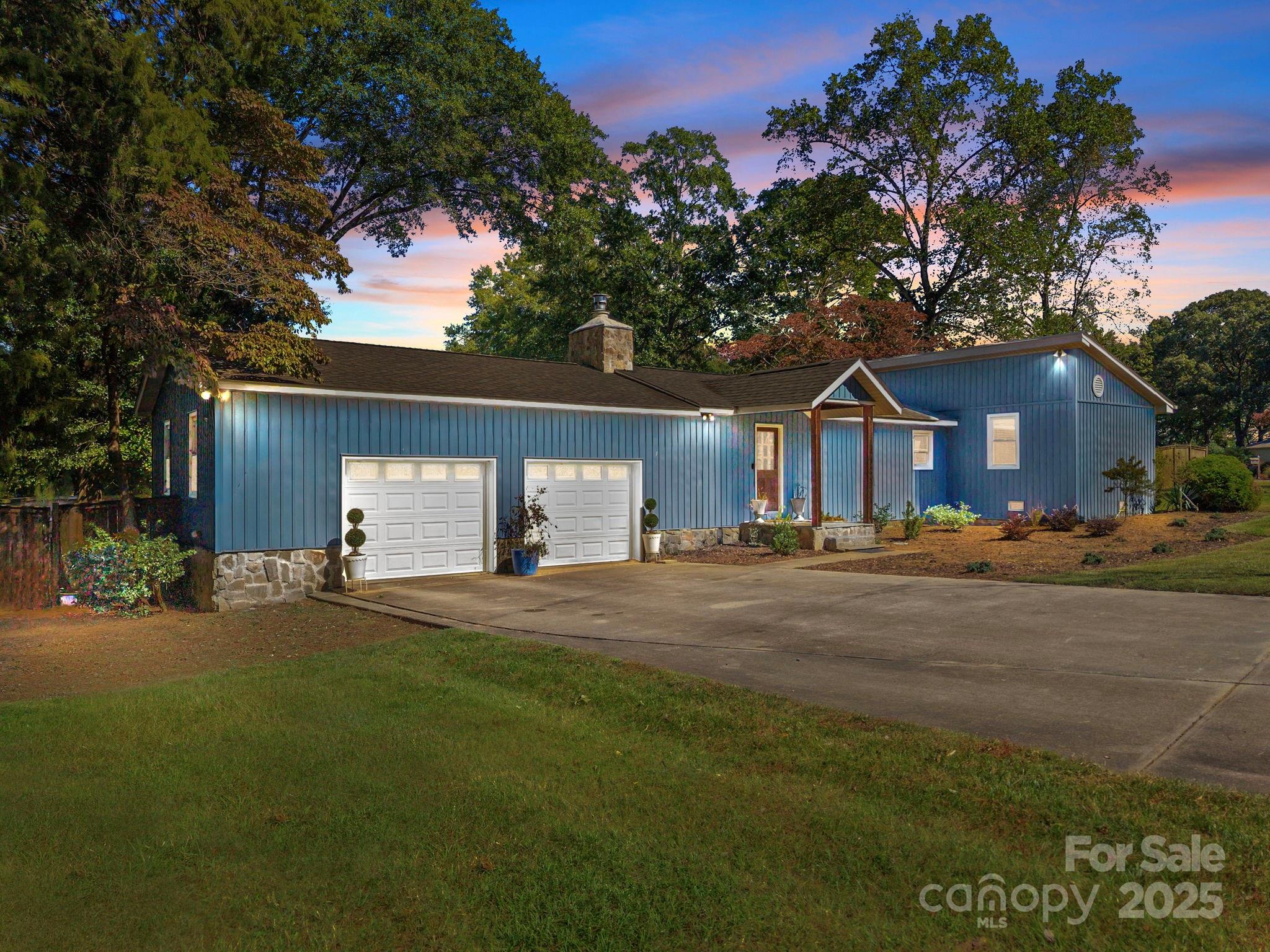 255 Topsail Road Salisbury, NC 28146 - Photo 1 of 47 a front view of a house with a yard and garage