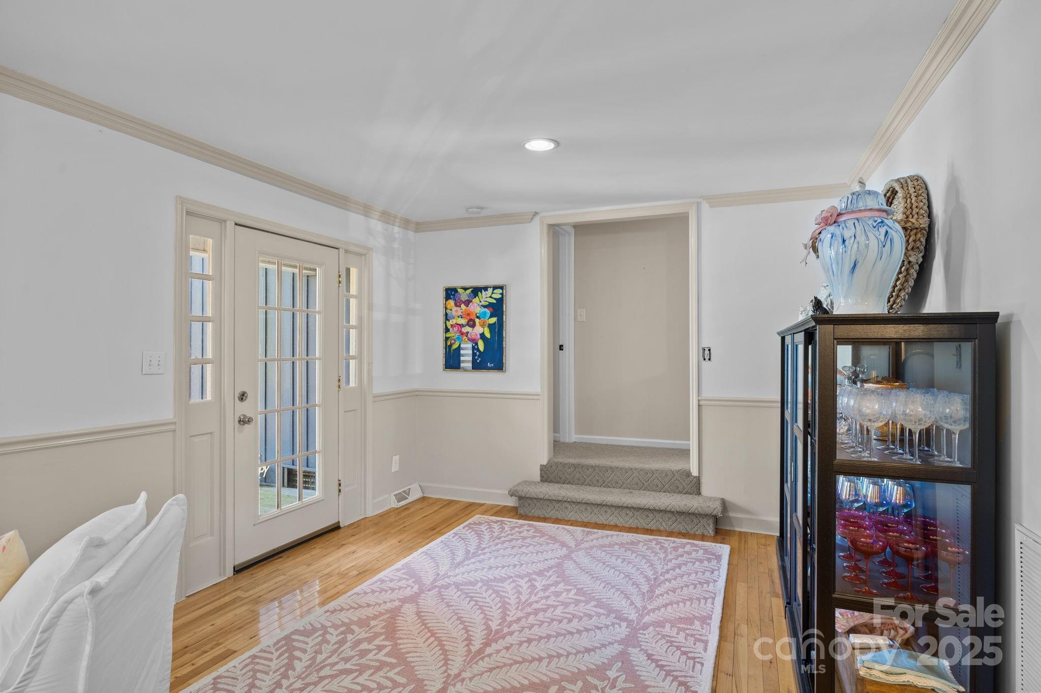 255 Topsail Road Salisbury, NC 28146 - Photo 22 of 47 a bedroom with a bed and wooden floor