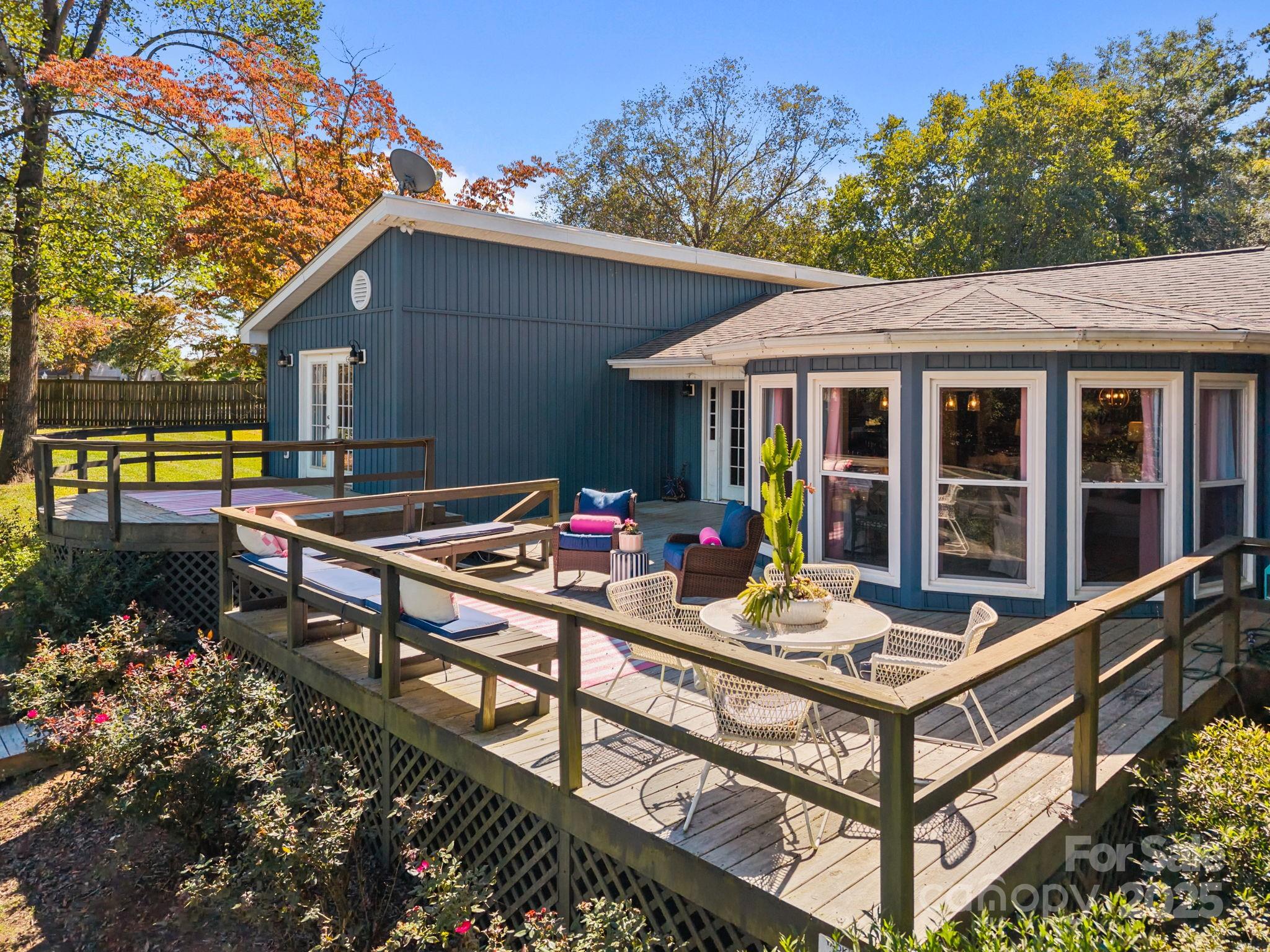 255 Topsail Road Salisbury, NC 28146 - Photo 33 of 47 a view of a chairs and tables in the back yard of the house