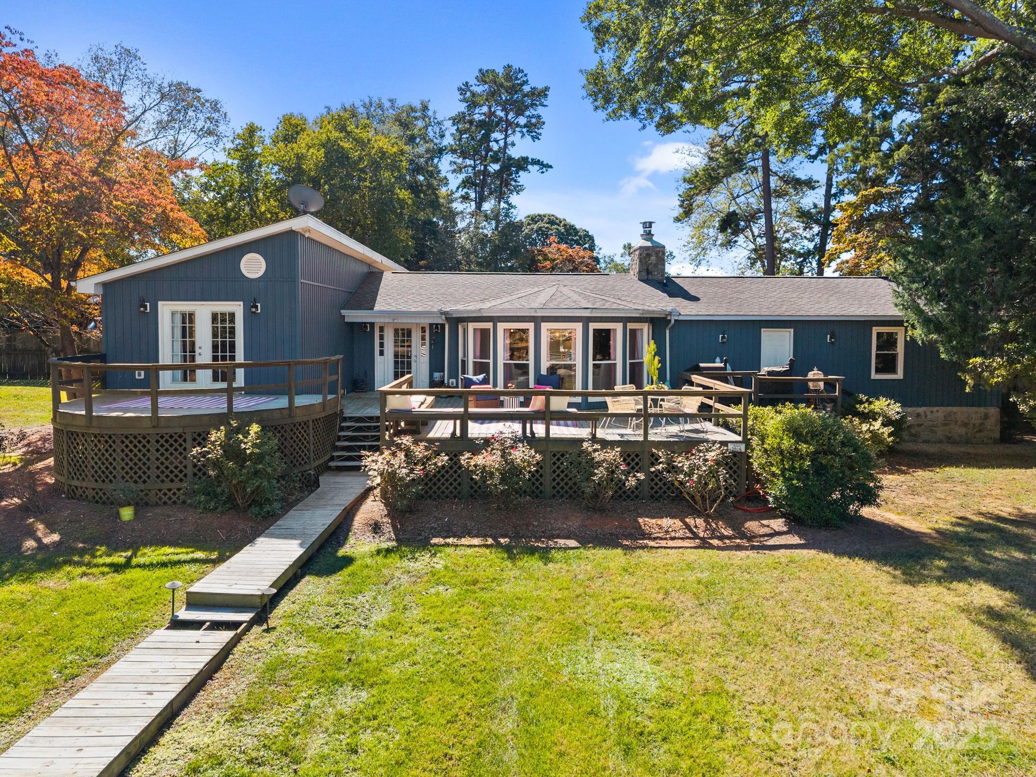 255 Topsail Road Salisbury, NC 28146 - Photo 34 of 47 a front view of a house with a yard table and chairs