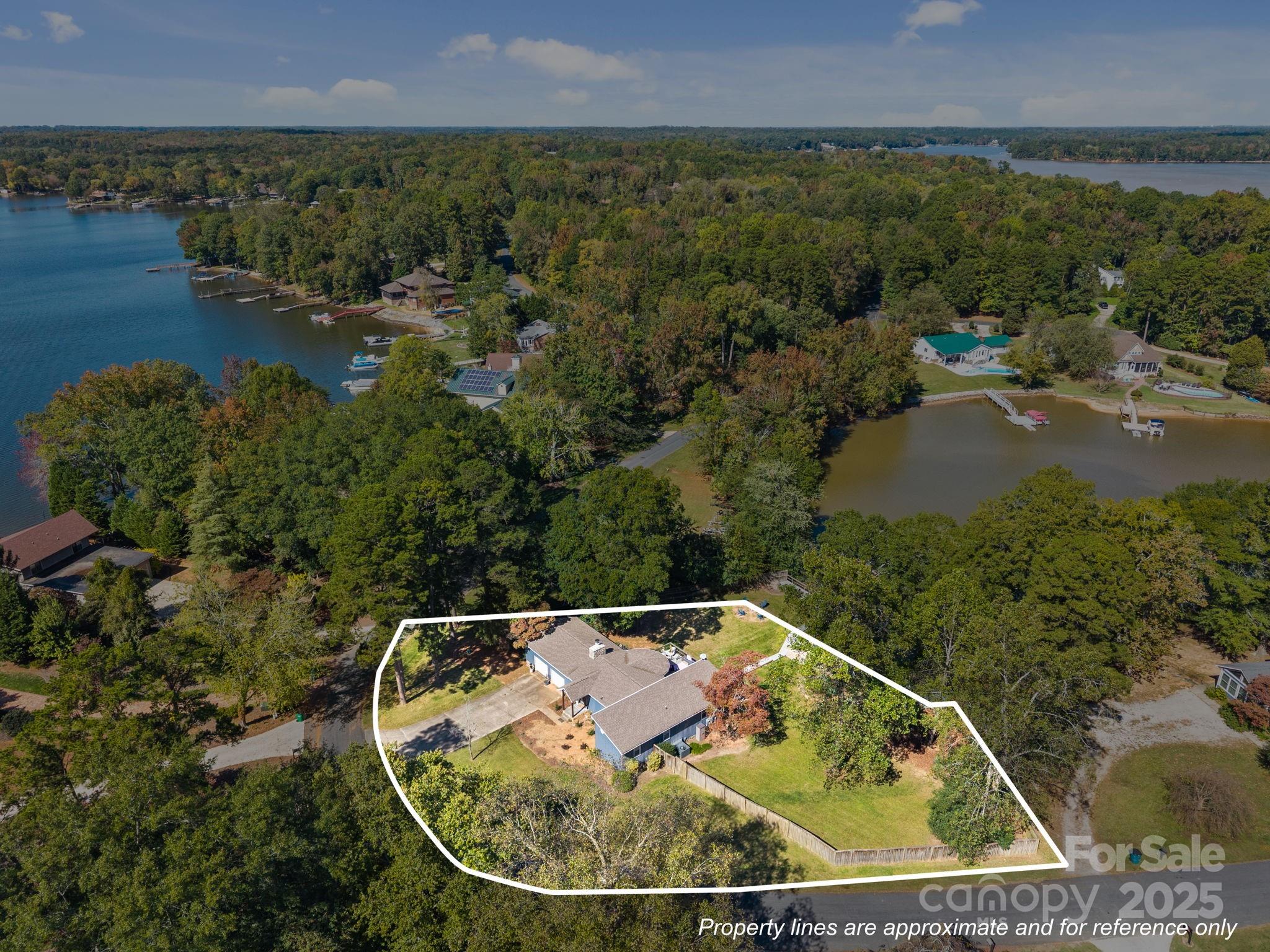 255 Topsail Road Salisbury, NC 28146 - Photo 47 of 47 an aerial view of a house with a yard and lake view