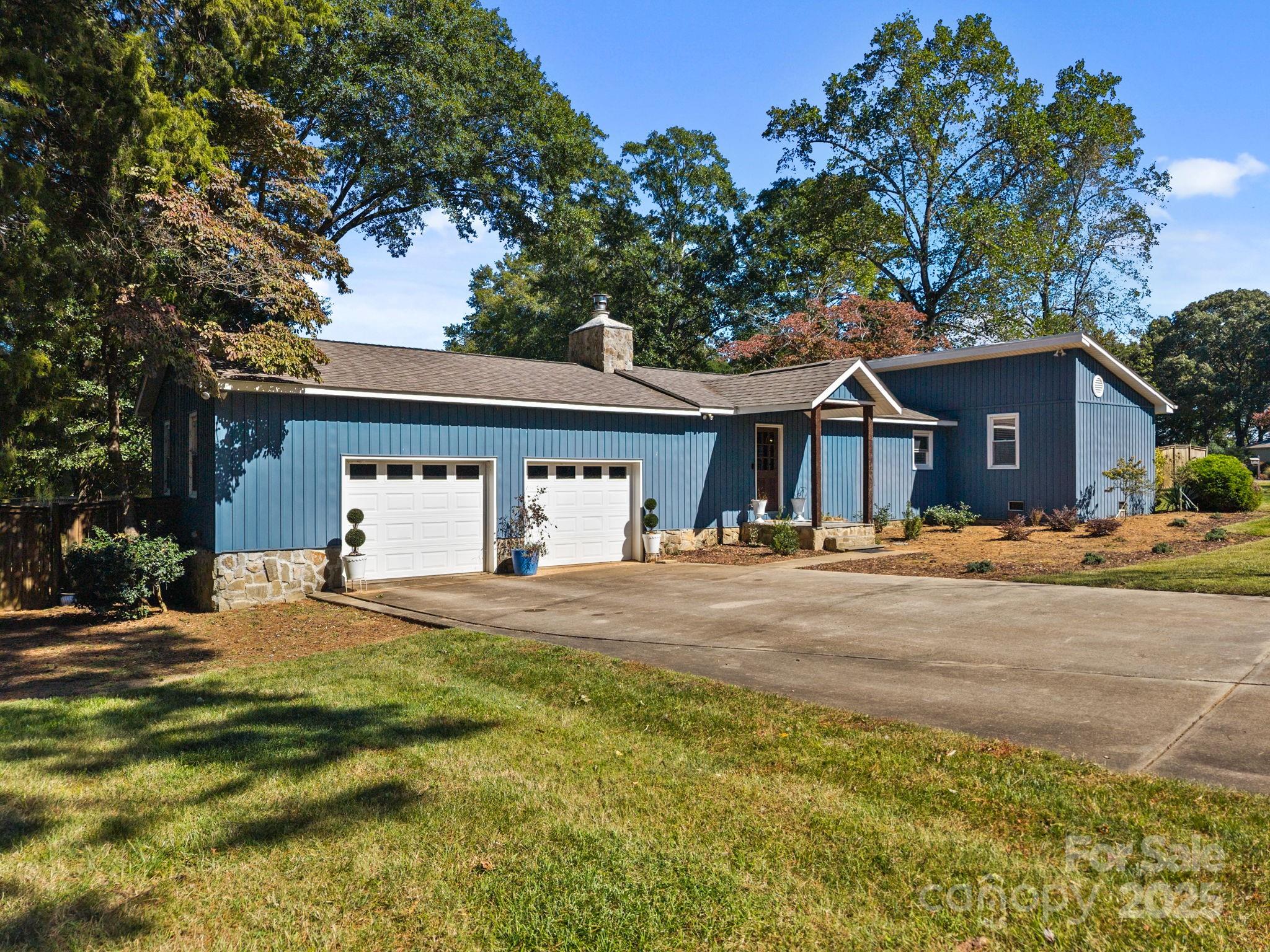 255 Topsail Road Salisbury, NC 28146 - Photo 6 of 47 a front view of a house with a garden