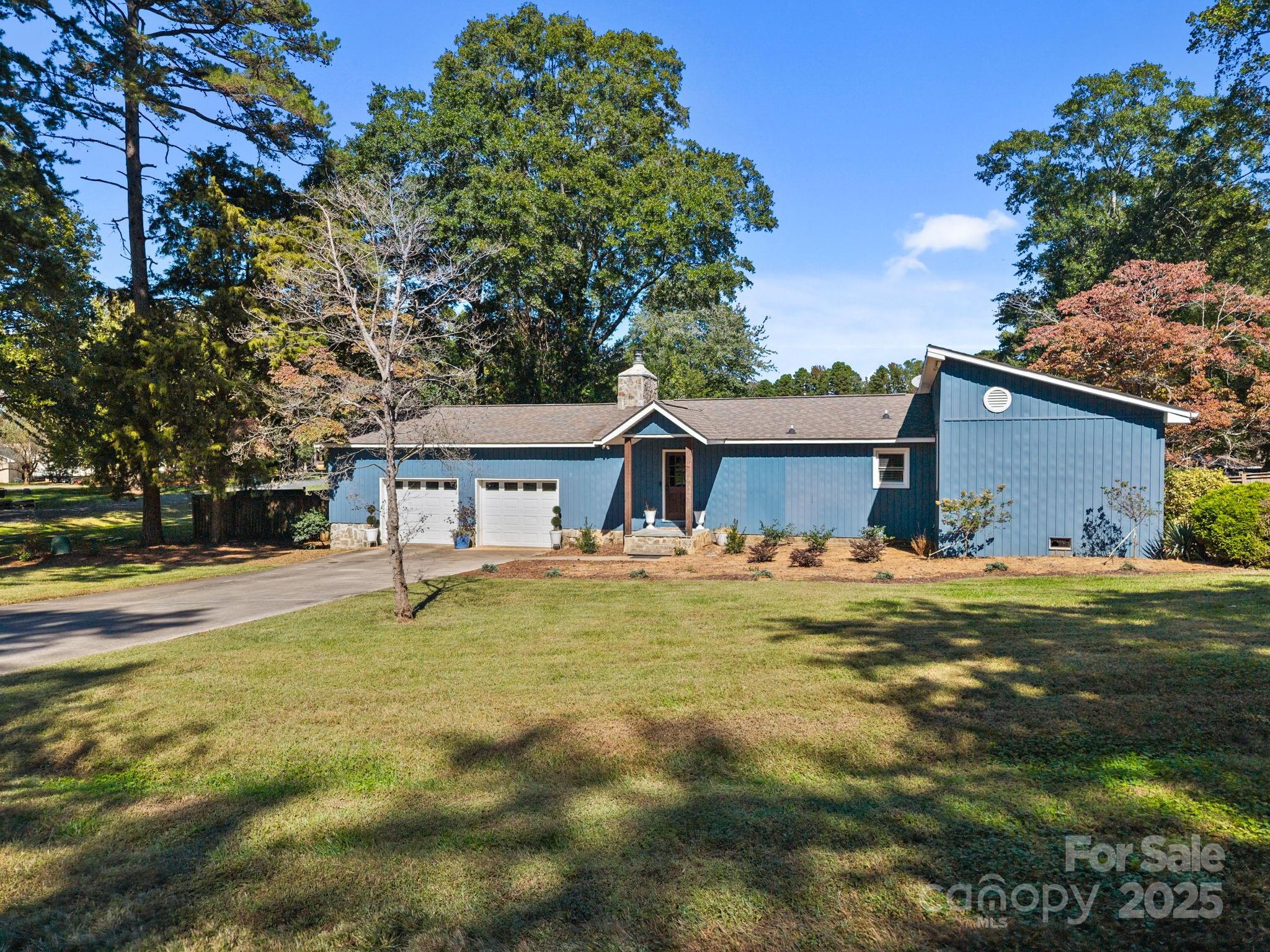 255 Topsail Road Salisbury, NC 28146 - Photo 7 of 47 a view of a house with pool and a big yard