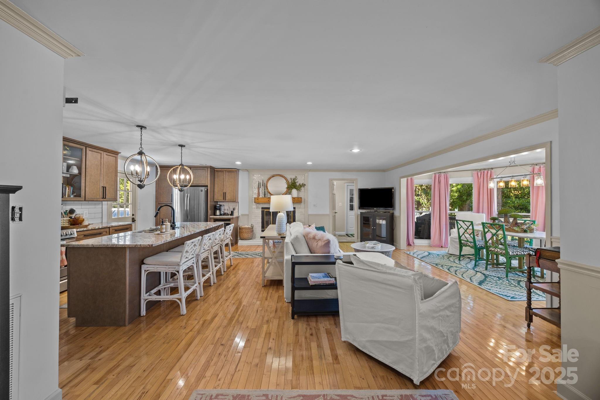 255 Topsail Road Salisbury, NC 28146 - Photo 10 of 47 a living room with fireplace furniture and a wooden floor