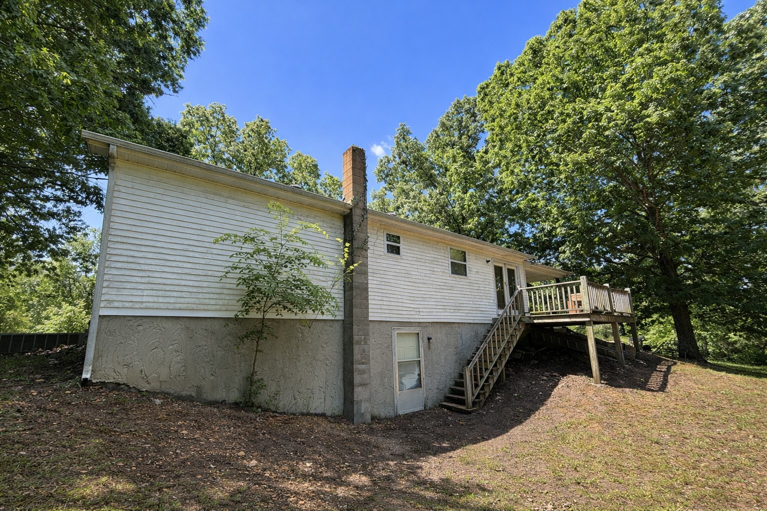 193 A W Schmidt Road Tennessee Ridge, TN 37178 - Photo 4 of 7 a view of backyard with large tree and wooden fence