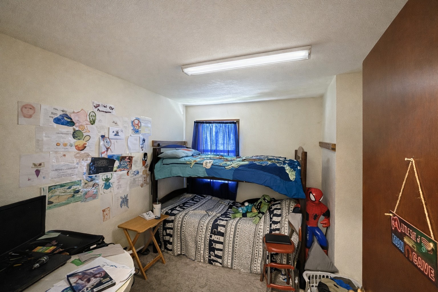 193 A W Schmidt Road Tennessee Ridge, TN 37178 - Photo 5 of 7 a bedroom with a bed and a computer on the desk next to a window
