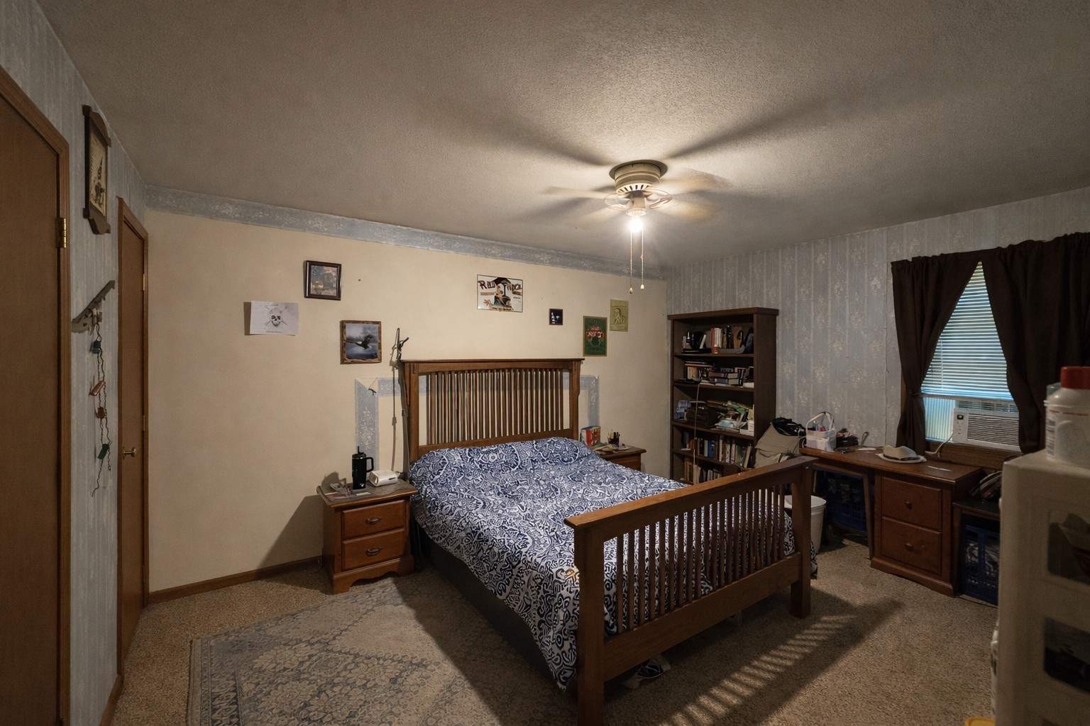 193 A W Schmidt Road Tennessee Ridge, TN 37178 - Photo 7 of 7 a bedroom that has a bed and a tv in it