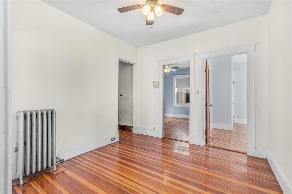 36 Mt Ida Road, Unit 3 Boston, MA 02122 - Photo 4 of 20 wooden floor in an empty room