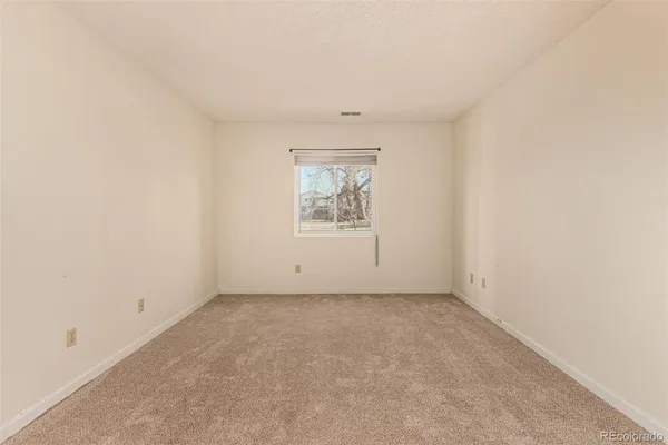 an empty room with a window