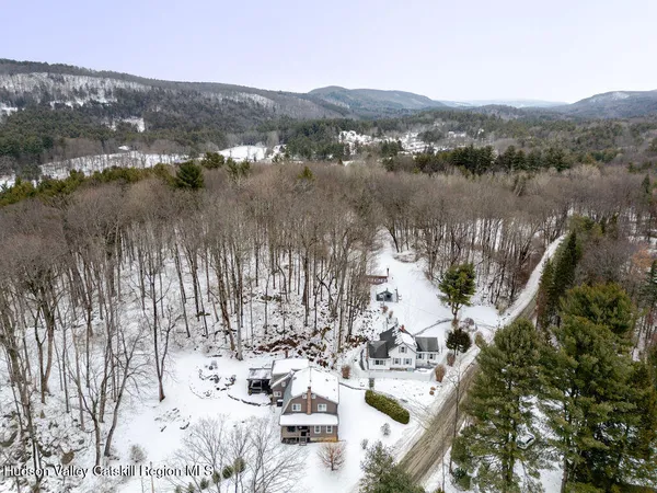 a view of a house with snow on the ground