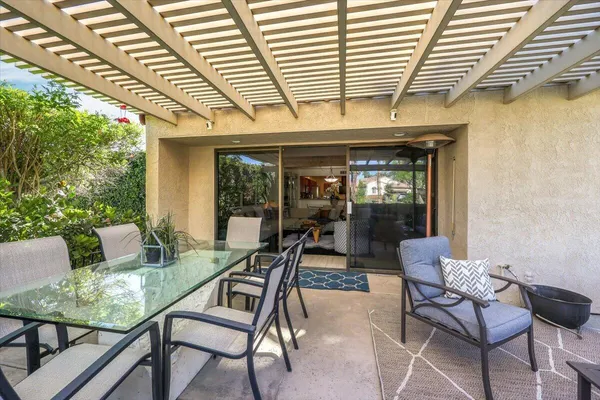 a outdoor living space with furniture and garden view