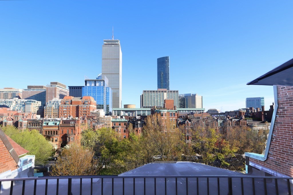 283 Commonwealth Avenue, Unit PH Boston, MA 02115 - Photo 2 of 18 a view of a city with tall buildings