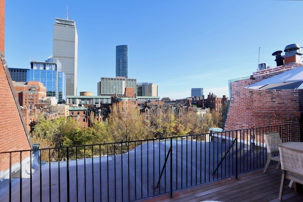 283 Commonwealth Avenue, Unit PH Boston, MA 02115 - Photo 10 of 18 a view of balcony and chairs