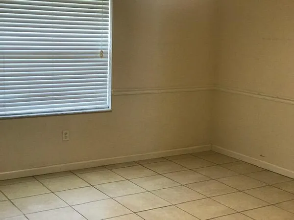 a view of a room that has a window in it