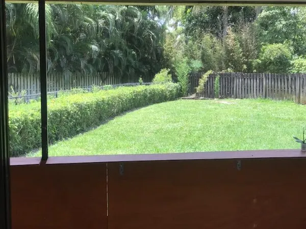 a view of outdoor space and yard