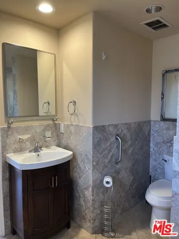 a bathroom with a sink and a toilet