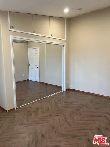 an empty room with cabinet