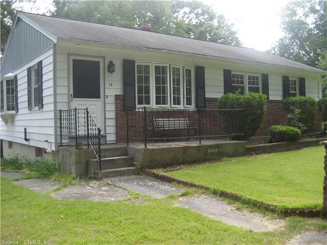 14 Benjamin Road Preston, CT 06365 - Photo 1 of 1 a front view of a house with garden