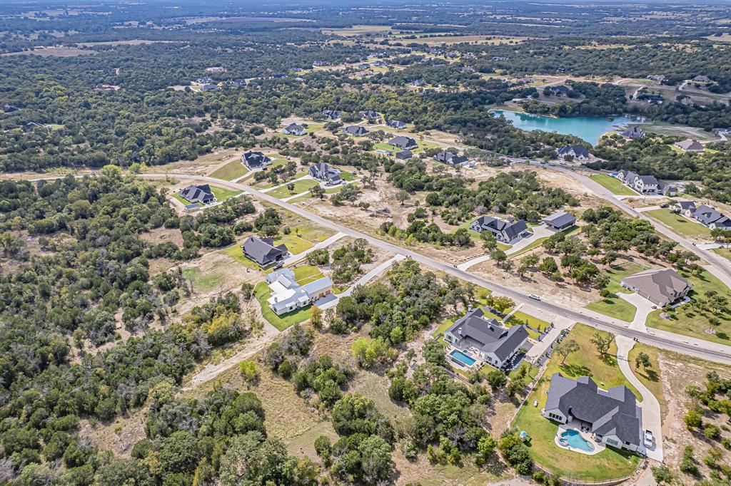 Lot 330 Sweeney Way Weatherford, TX 76087 - Photo 12 of 21 Aerial view of property's location with nearby suburban area and a nearby body of water