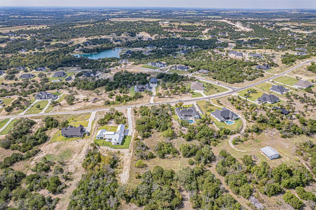 Lot 330 Sweeney Way Weatherford, TX 76087 - Photo 10 of 21 Aerial overview of property's location with nearby suburban area and a nearby body of water