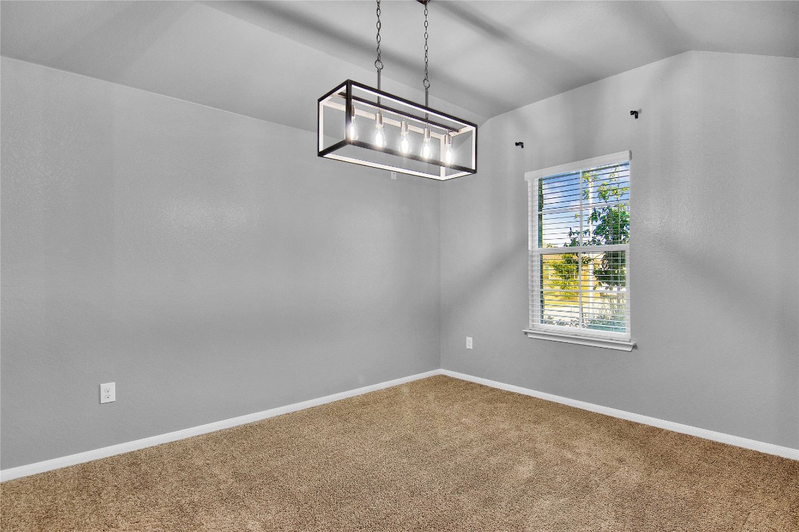 704 Red Tails Drive Austin, TX 78725 - Photo 17 of 37 a view of an empty room with a window