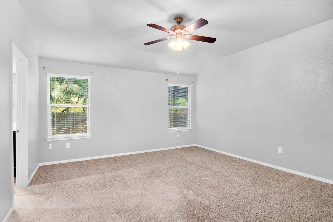 704 Red Tails Drive Austin, TX 78725 - Photo 19 of 37 an empty room with a window