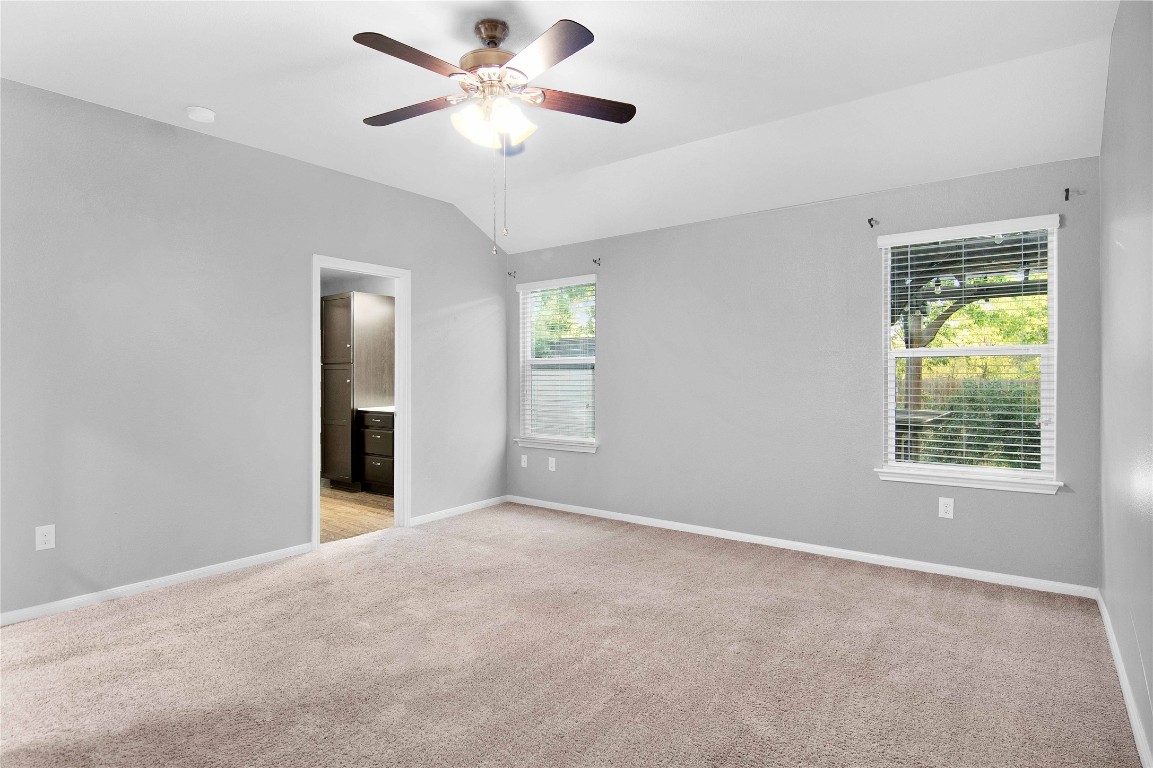 704 Red Tails Drive Austin, TX 78725 - Photo 20 of 37 a view of an empty room with a window
