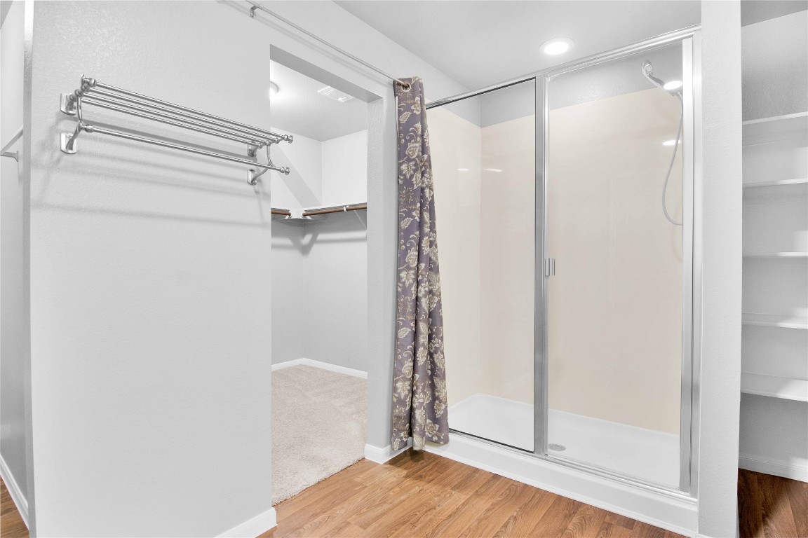 704 Red Tails Drive Austin, TX 78725 - Photo 25 of 37 a bathroom with a shower