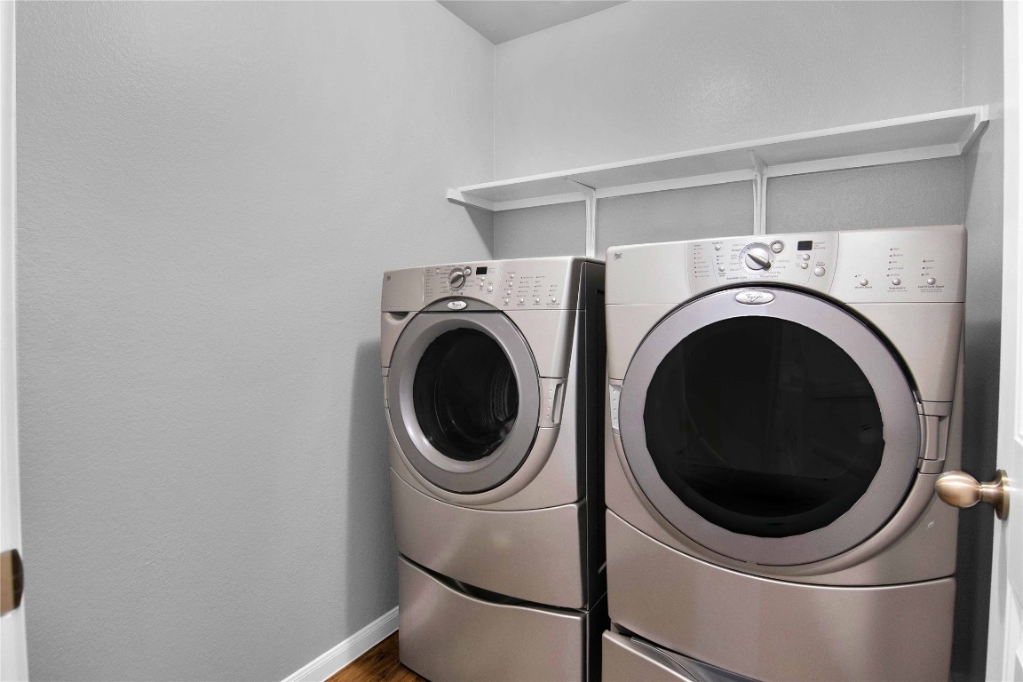 704 Red Tails Drive Austin, TX 78725 - Photo 27 of 37 a utility room with dryer and washer