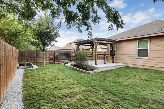 a view of a backyard with plants