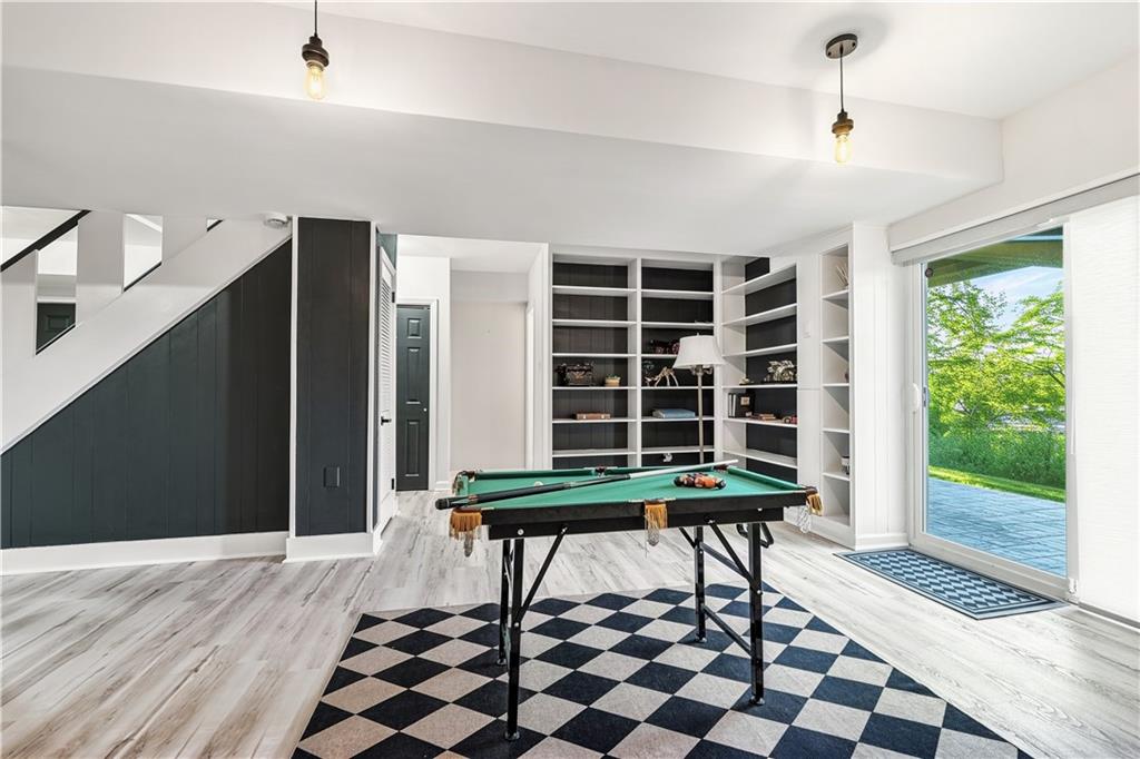 736 Pinetree Road Pittsburgh, PA 15243 - Photo 36 of 43 Finshed gameroom features sliding doors that open to the patio creating a wonderful extension to the entertaining space