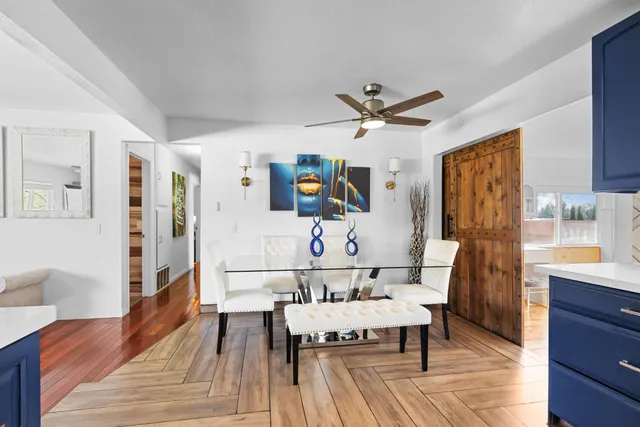 a kitchen with a sink stove and microwave