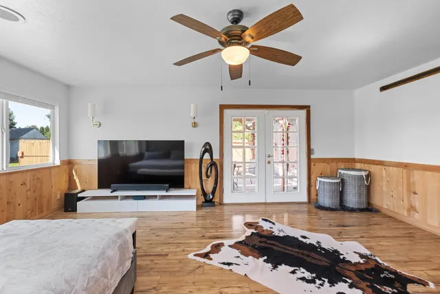 a kitchen with stainless steel appliances a refrigerator and a stove