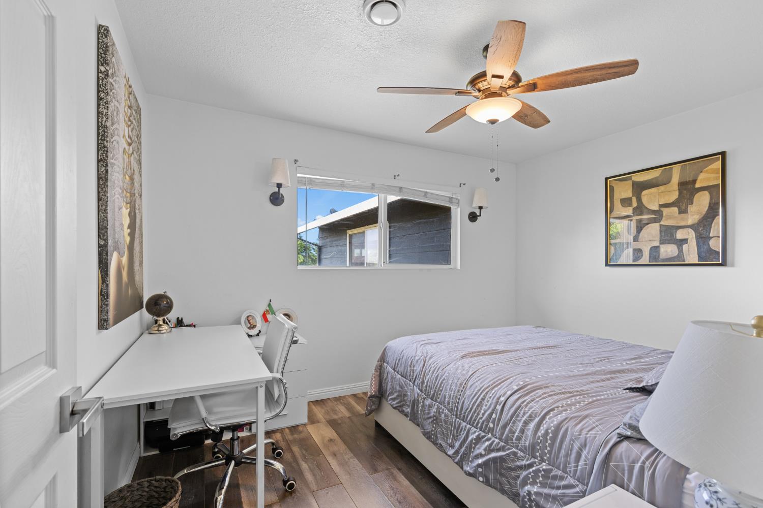 2409 Rio Oso Road Rio Oso, CA 95674 - Photo 22 of 67 a bedroom with a bed and a table