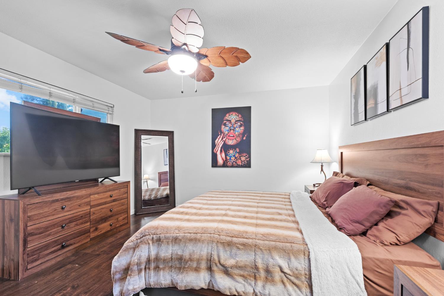 2409 Rio Oso Road Rio Oso, CA 95674 - Photo 27 of 67 a bedroom with a bed and a flat screen tv