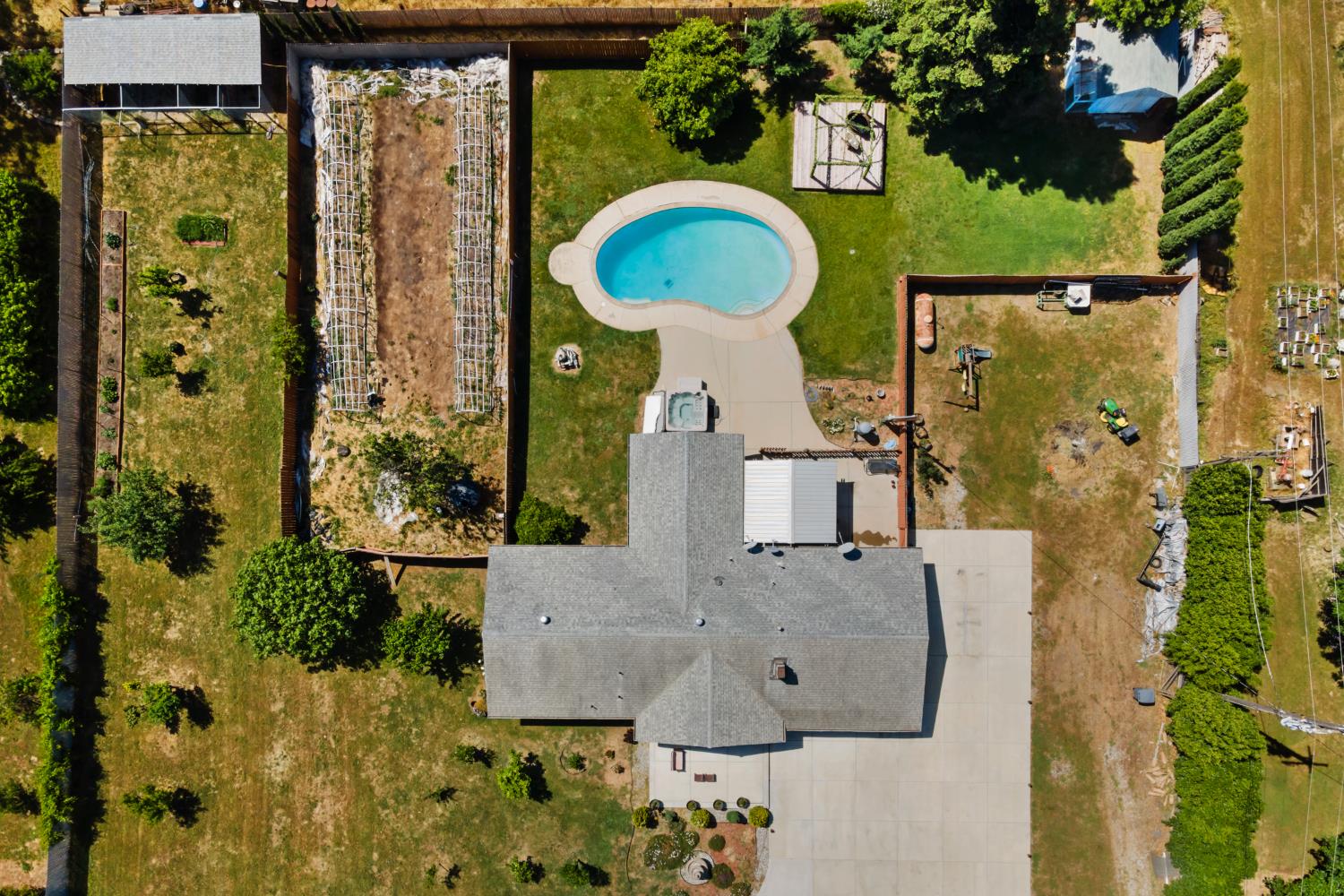 2409 Rio Oso Road Rio Oso, CA 95674 - Photo 33 of 67 aerial view of a house with a swimming pool