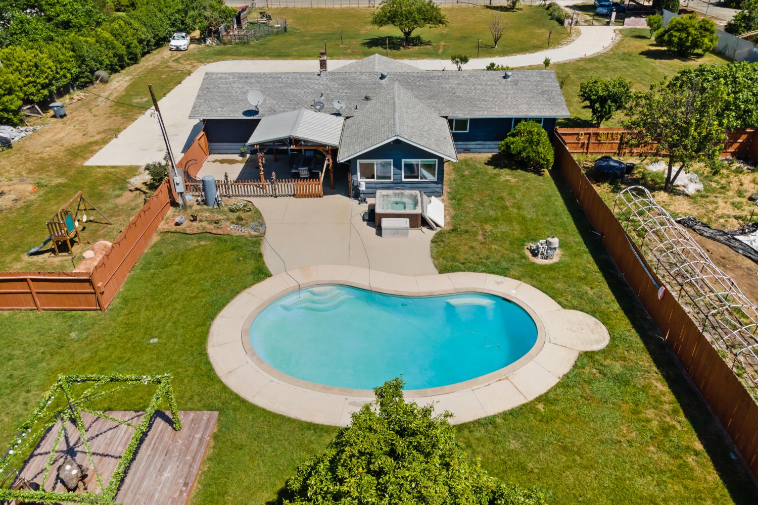 2409 Rio Oso Road Rio Oso, CA 95674 - Photo 35 of 67 an aerial view of a house with swimming pool patio and outdoor seating