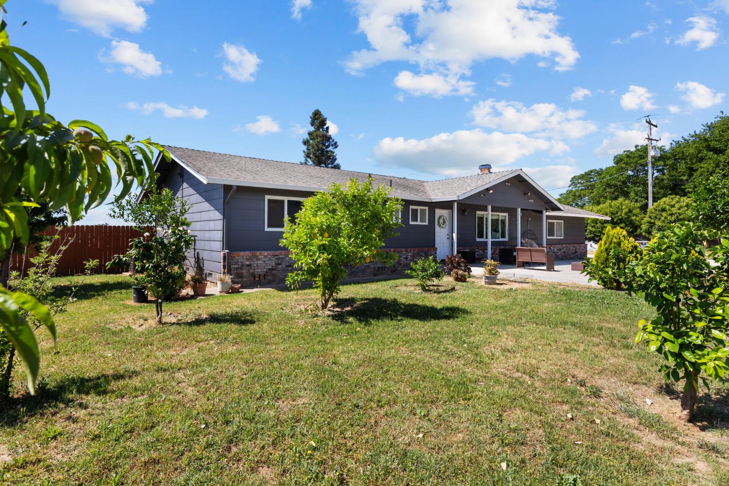 2409 Rio Oso Road Rio Oso, CA 95674 - Photo 50 of 67 a swimming pool with outdoor seating and yard