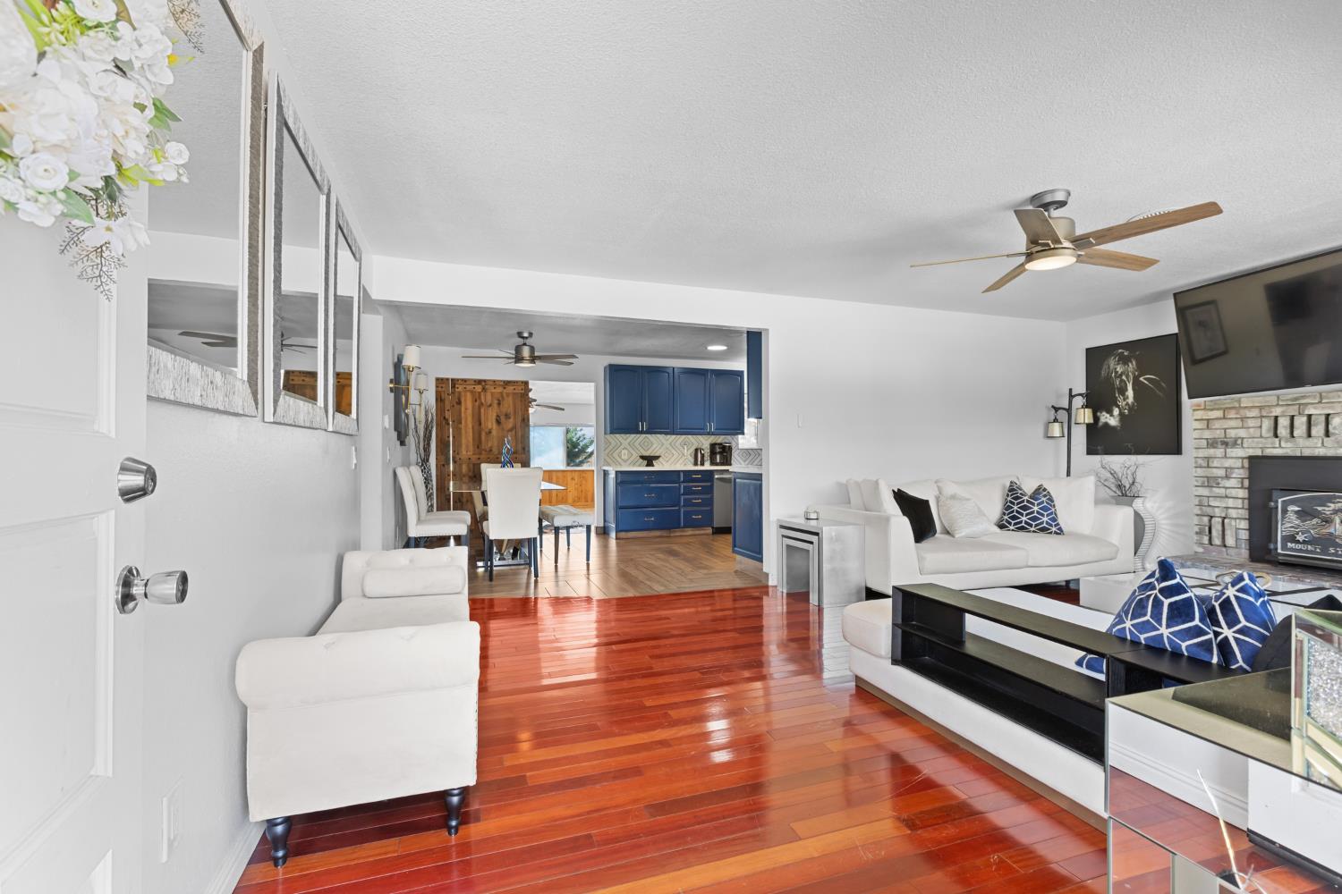 2409 Rio Oso Road Rio Oso, CA 95674 - Photo 7 of 67 a living room with furniture and a wooden floor