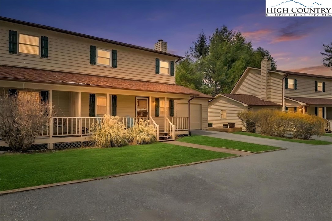 194 Carriage Lamp Court Boone, NC 28607 - Photo 2 of 26 a front view of house with yard and green space