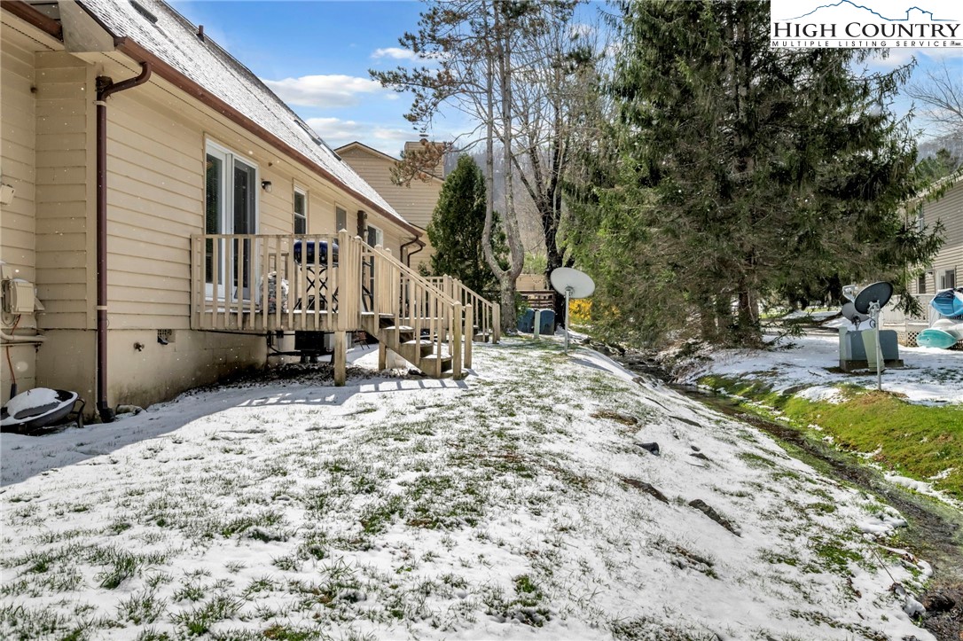 194 Carriage Lamp Court Boone, NC 28607 - Photo 24 of 26 a view of a house with snow on the road