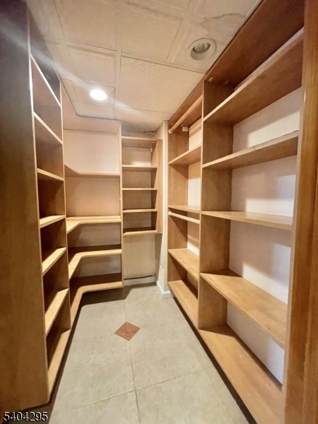 662 Foothill Road Bridgewater, NJ 08807 - Photo 36 of 46 a view of walk in closet with empty racks