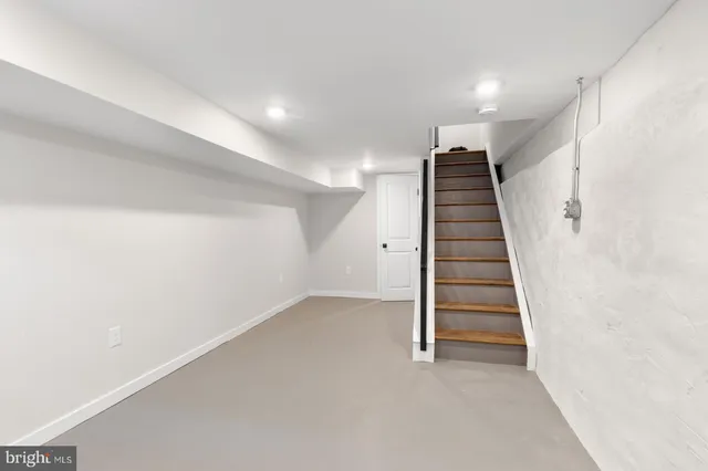 a view of entryway with stairs